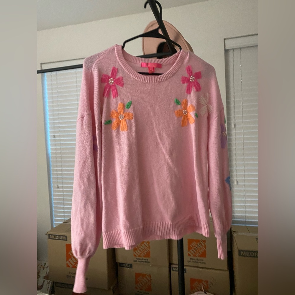 Light pink Lily Pulitzer sweater with flowers on it